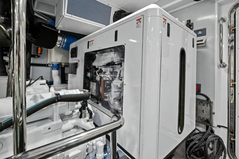 Slide: The Image of Engine room of 2024 Marlow 90 V yacht, showcasing advanced machinery and equipment. - 101