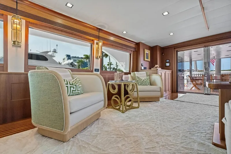 Slide: The Image of Luxurious interior of 2024 Marlow 90 V yacht with elegant seating and decor. - 12