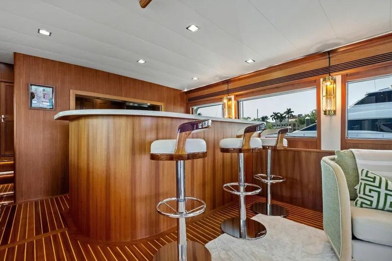 Slide: The Image of Luxurious interior of 2024 Marlow 90 V yacht with elegant bar and seating. - 17