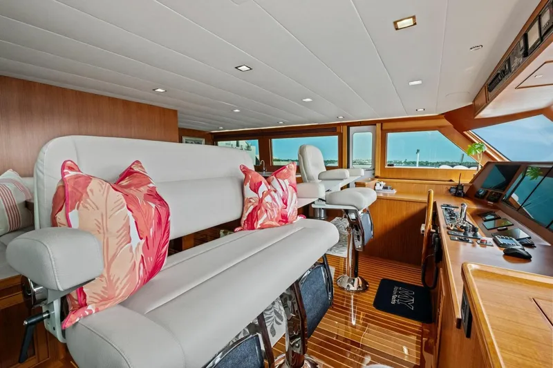 Slide: The Image of Luxurious interior of 2024 Marlow 90 V yacht with plush seating and modern controls. - 68