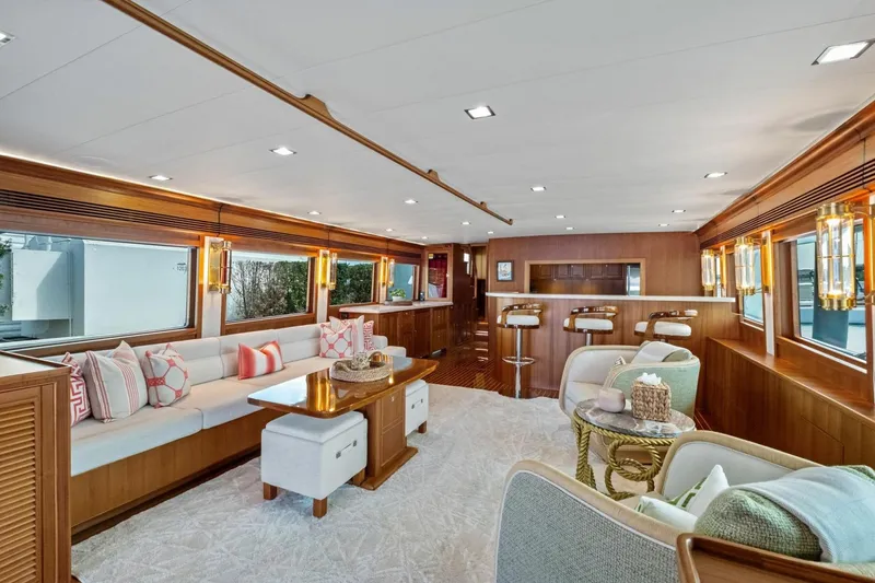 Slide: The Image of Luxurious interior of 2024 Marlow 90 V yacht with elegant seating and modern decor. - 7