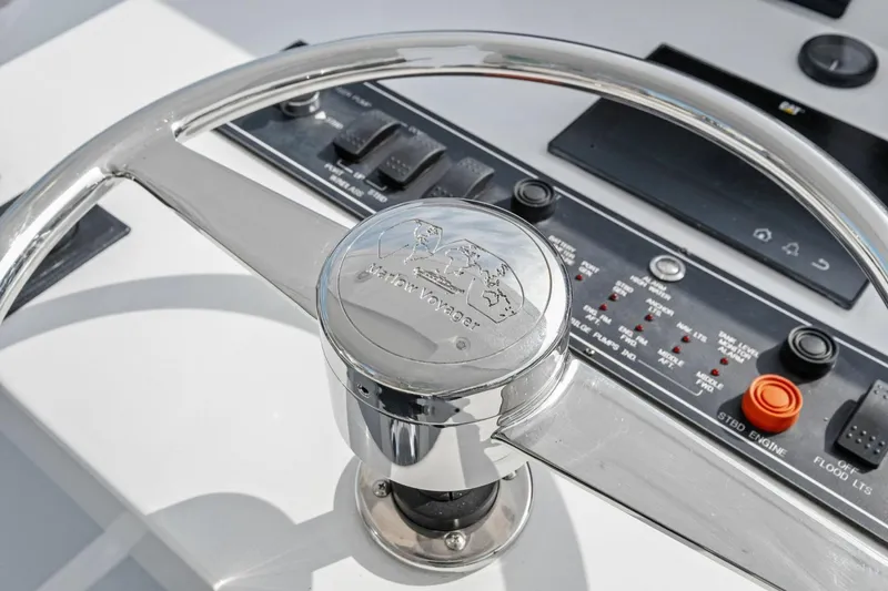Slide: The Image of Steering wheel of 2024 Marlow 90 V yacht with control panel. - 72