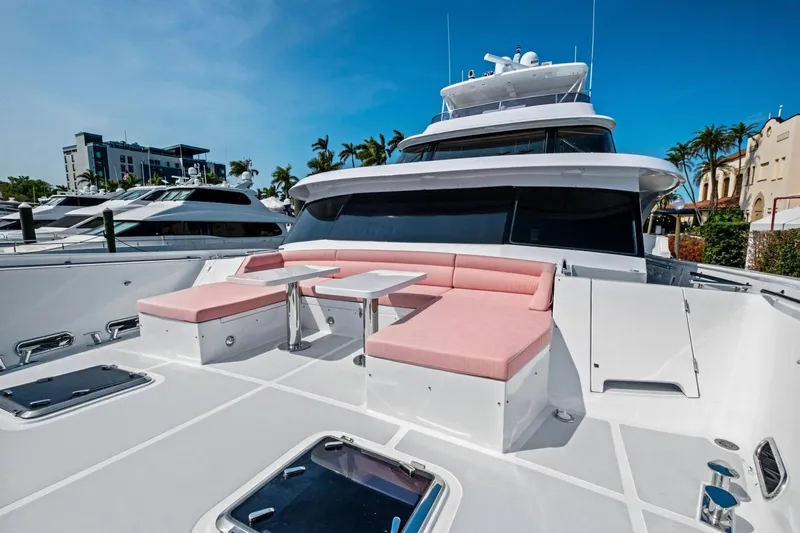 Slide: The Image of 2024 Marlow 90 V yacht with pink seating and sleek design. - 81