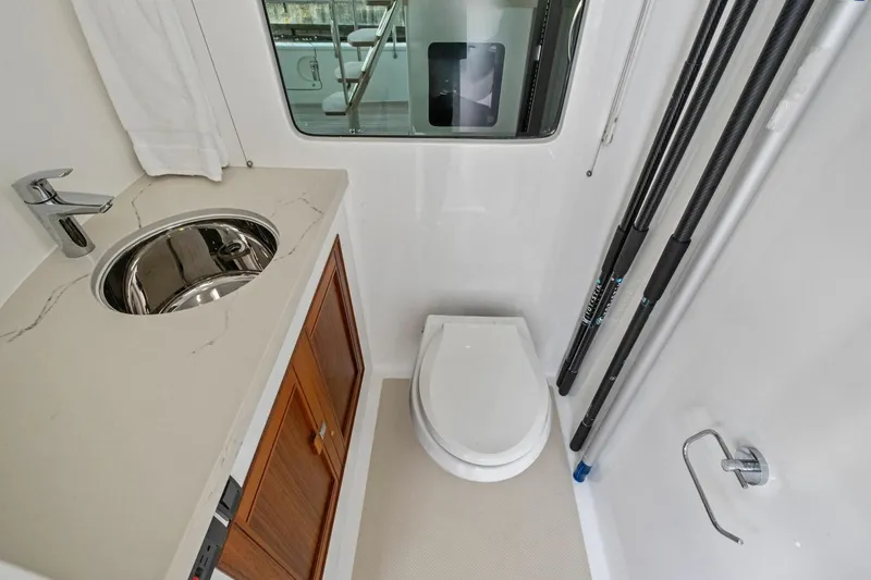 Slide: The Image of Bathroom interior of 2024 Marlow 90 V yacht with sink and toilet. - 85