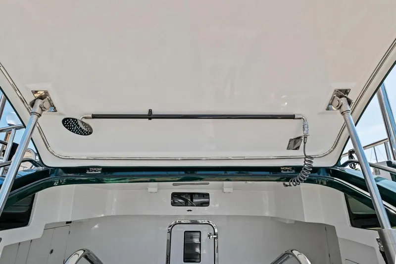 Slide: The Image of 2024 Marlow 90 V yacht deck with shower and stainless steel fittings. - 91