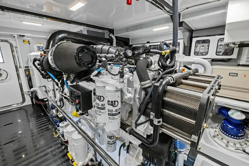 Slide: The Image of Engine room of 2024 Marlow 90 V yacht, showcasing advanced machinery and components. - 97