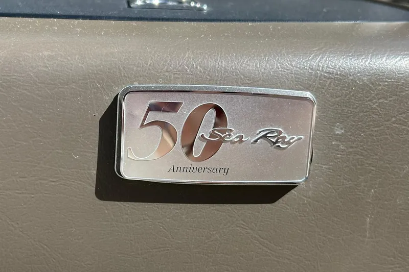 Slide: The Image of 50th Anniversary Sea Ray badge on 2009 Sea Ray 210 boat. - 44