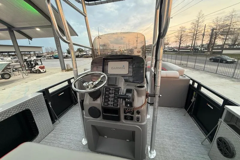 Slide: The Image of 2022 Apex Marine 8524 Pro Fish N Cruise boat dashboard with Garmin navigation system. - 17