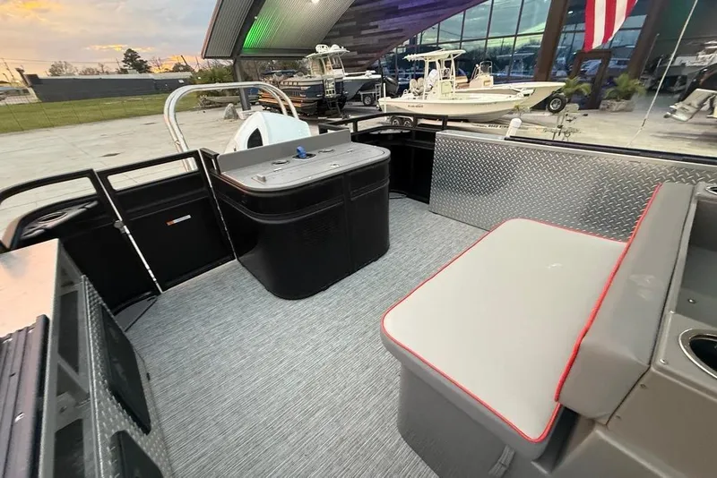 Slide: The Image of 2022 Apex Marine 8524 Pro Fish N Cruise interior with seating and fishing station. - 20