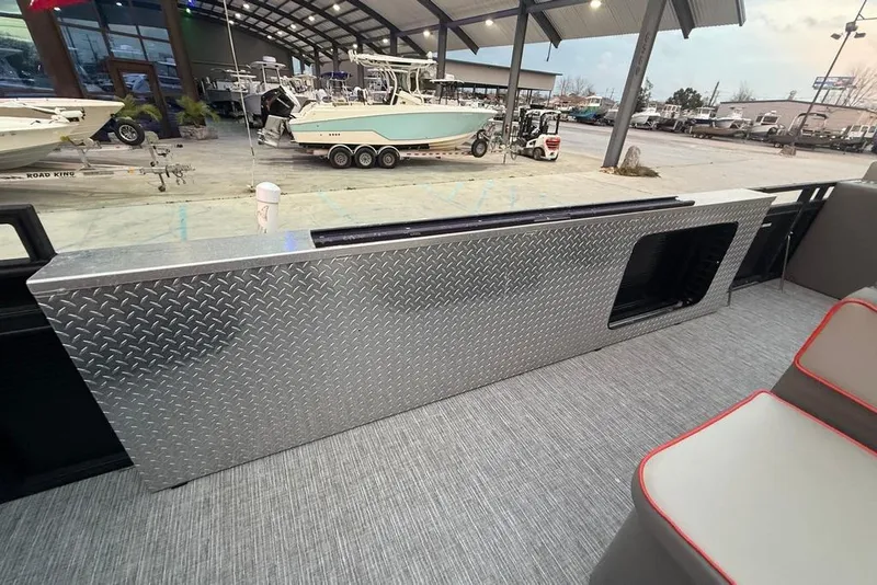 Slide: The Image of 2022 Apex Marine 8524 Pro Fish N Cruise interior with diamond plate detail. - 21