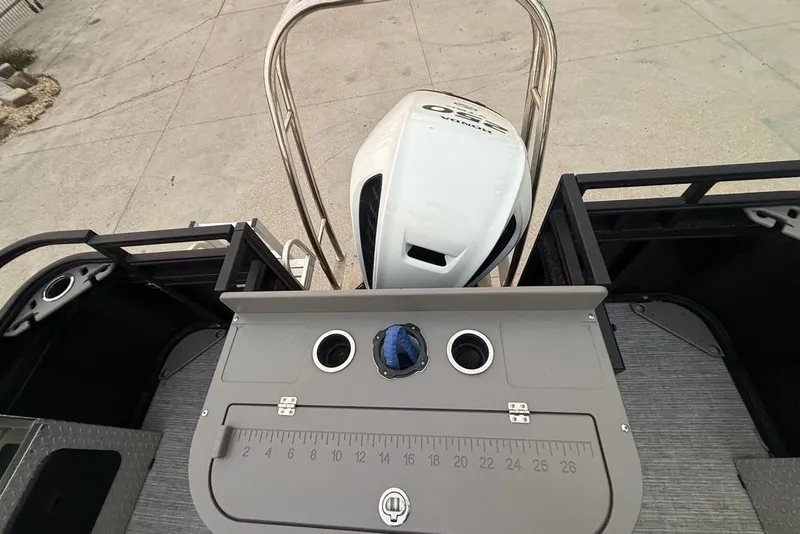 Slide: The Image of 2022 Apex Marine 8524 Pro Fish N Cruise boat with Honda outboard motor and fishing station. - 25