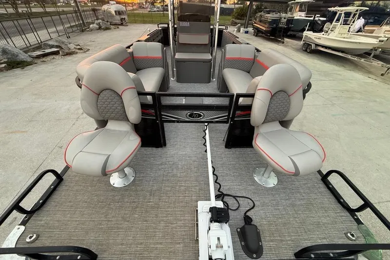 Slide: The Image of 2022 Apex Marine 8524 Pro Fish N Cruise pontoon boat with spacious seating and modern design. - 9