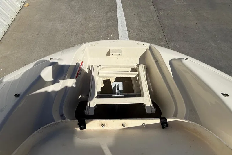 Slide: The Image of Bow view of a 2007 Sea Ray 270 Sundeck with anchor compartment. - 23