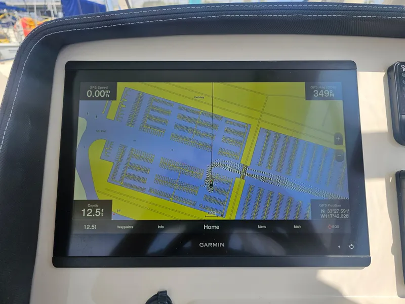 Slide: The Image of Garmin navigation system on Grady-White Freedom 275, 2022 model. - 14