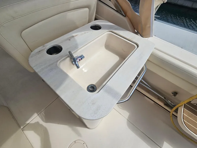 Slide: The Image of Interior of Grady-White Freedom 275 with built-in sink, 2022 model. - 24