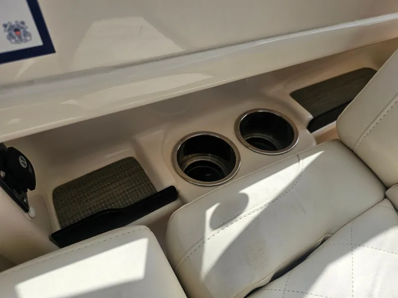 Slide: The Image of Interior of 2022 Grady-White Freedom 275 boat with cup holders. - 32