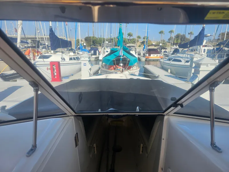 Slide: The Image of Interior view of 2022 Grady-White Freedom 275 in marina. - 43