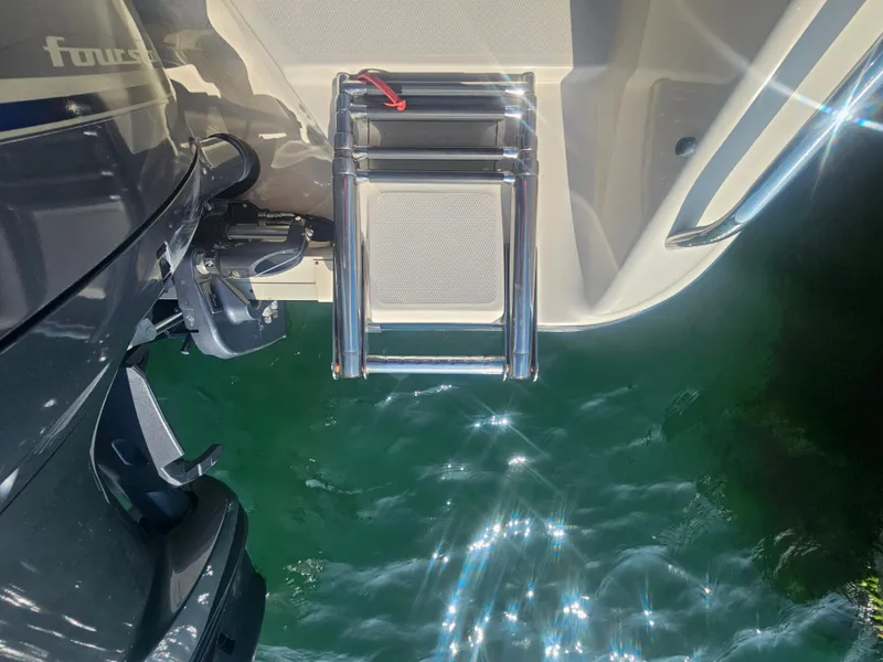 Slide: The Image of Grady-White Freedom 275 boat with motor and ladder, 2022 model. - 48