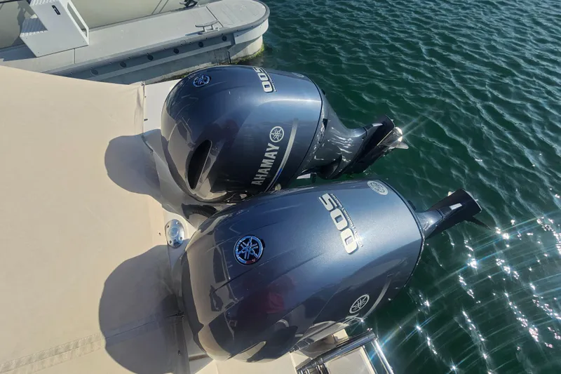 Slide: The Image of Two Yamaha outboard motors on a 2022 Grady-White Freedom 275 boat. - 49