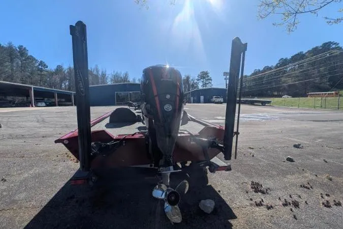 Slide: The Image of 2022 Tracker Pro Team 195 TXW Tournament Edition boat, rear view in sunny outdoor setting. - 3