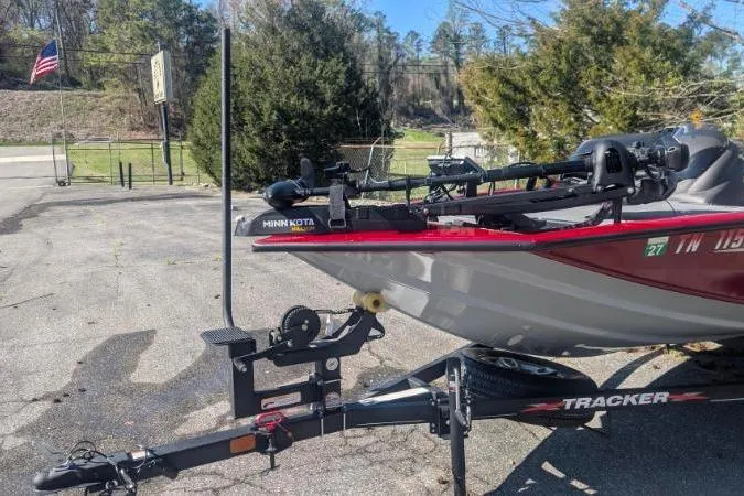 Slide: The Image of 2022 Tracker Pro Team 195 TXW Tournament Edition boat on trailer, featuring Minn Kota trolling motor. - 5
