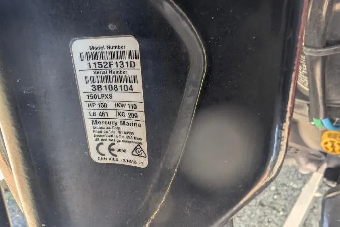 Slide: The Image of Label on a 2022 Tracker Pro Team 195 TXW Tournament Edition boat engine. - 9