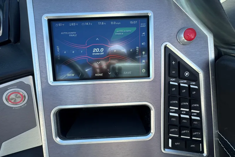Slide: The Image of 2019 MasterCraft XT22 dashboard with touchscreen controls and ballast settings. - 18