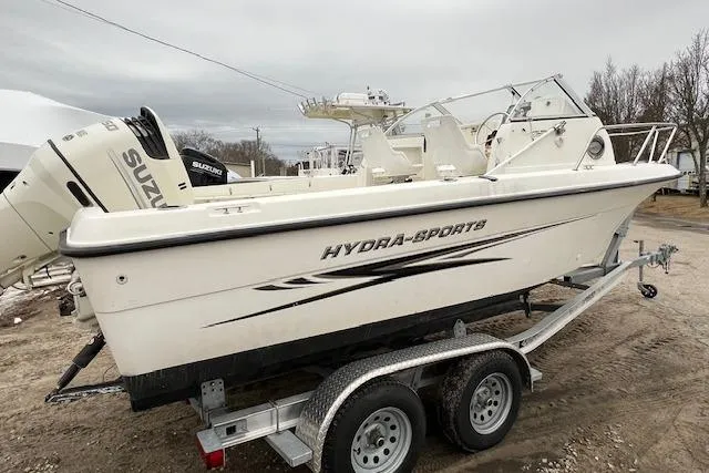 Slide: The Image of 2004 Hydra-Sports Lightning 212 WA boat on trailer with Suzuki outboard motor. - 8