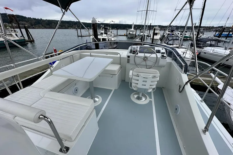 Slide: The Image of Helmsman Trawlers 37 Sedan - Flybridge Helms / Settee - 3