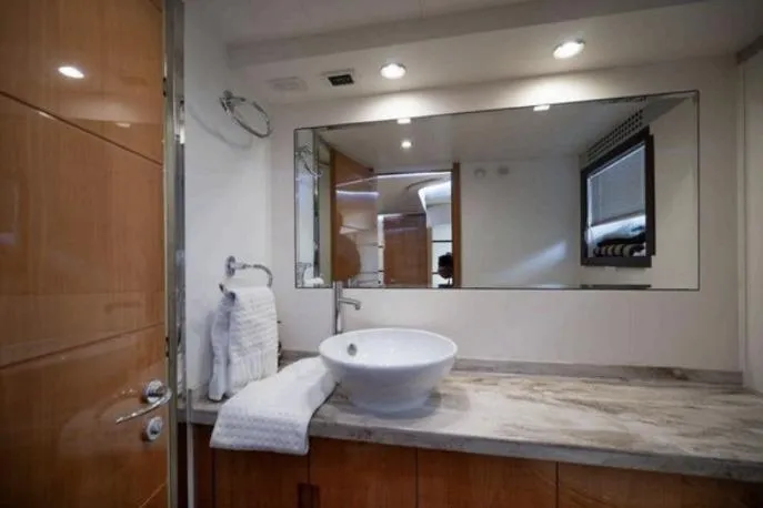 Slide: The Image of Luxurious bathroom interior of 2007 Pershing 62' yacht with modern sink and large mirror. - 6