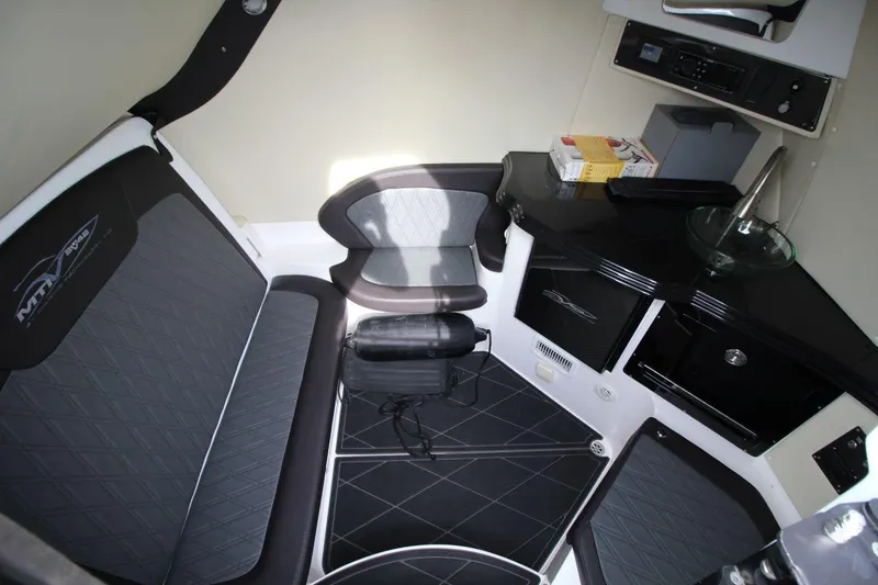 Slide: The Image of Luxurious interior of 2018 MTI V42 boat with seating and modern amenities. - 22