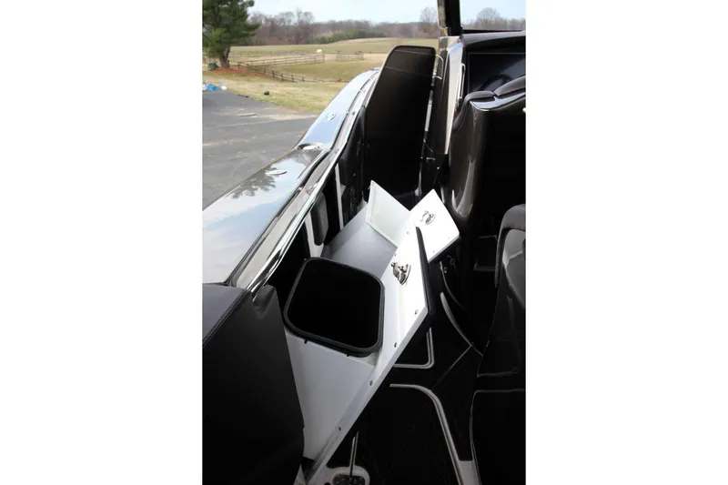 Slide: The Image of Interior view of 2018 MTI V42 boat with open storage compartment. - 24
