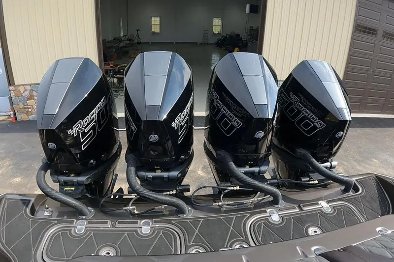 Slide: The Image of Four powerful Mercury Racing 500 outboard engines on a 2018 MTI V42 boat. - 27