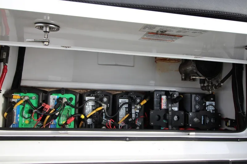 Slide: The Image of Battery compartment of 2018 MTI V42 boat, showing multiple connected batteries. - 31