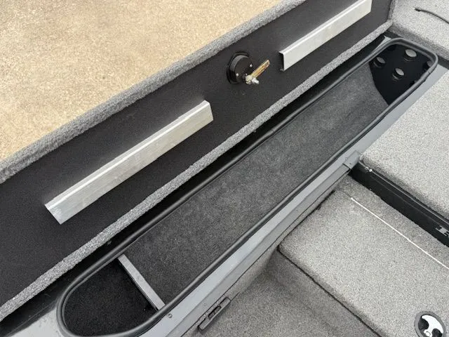 Slide: The Image of Interior view of 2023 Ranger RT178 with storage compartment and carpeted flooring. - 12