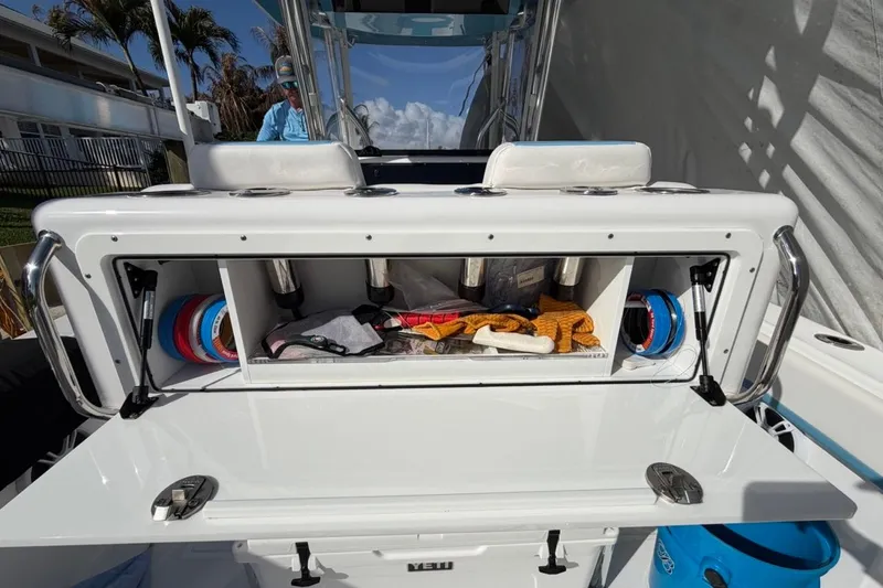 Slide: The Image of Electrical panel inside 2022 Bluewater 2850 CC boat, showcasing wiring and connections. - 17