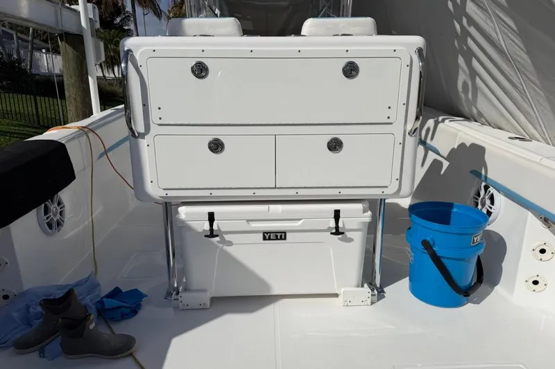 Slide: The Image of Twin Mercury outboard engines on a 2022 Bluewater 2850 CC boat docked in Hobe Sound, FL. - 22