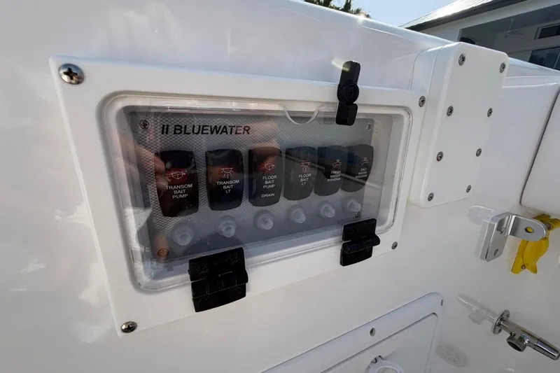 Slide: The Image of Livewell compartment on a 2022 Bluewater 2850 CC boat, open and empty. - 26