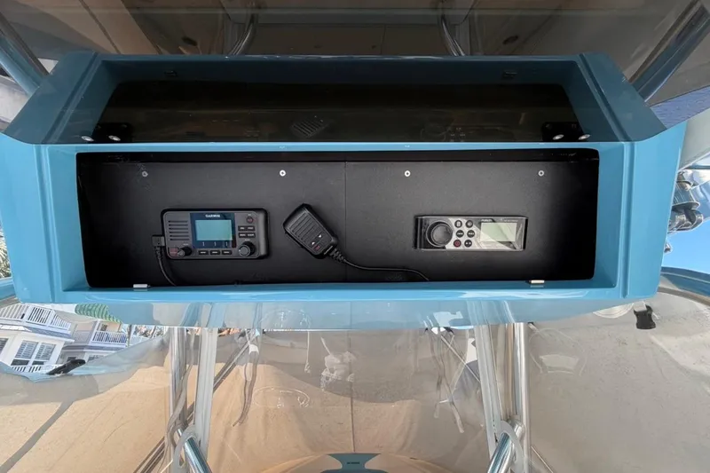 Slide: The Image of Garmin navigation system on 2022 Bluewater 2850 CC boat dashboard. - 7