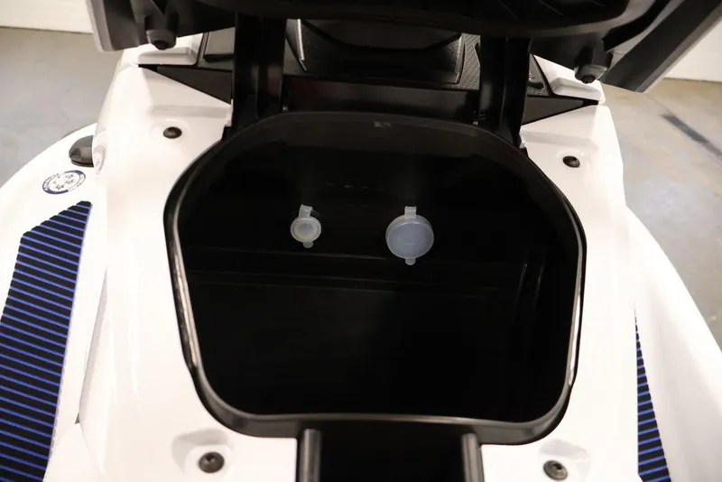 Slide: The Image of 2026 Yamaha WaveRunner VX Deluxe storage compartment, open view, showcasing interior space. - 10