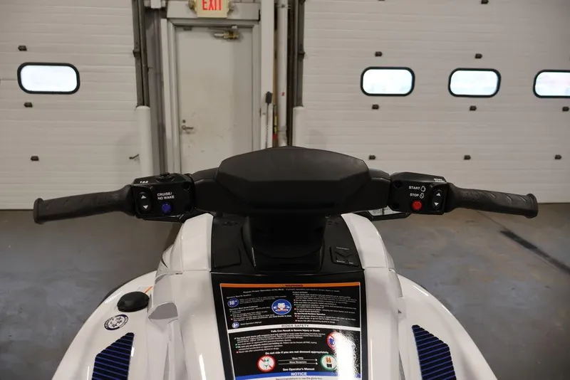Slide: The Image of 2026 Yamaha WaveRunner VX Deluxe handlebars in a garage setting. - 11