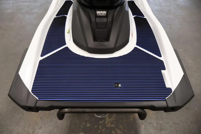 Slide: The Image of 2026 Yamaha WaveRunner VX Deluxe rear deck with blue and black traction mats. - 19