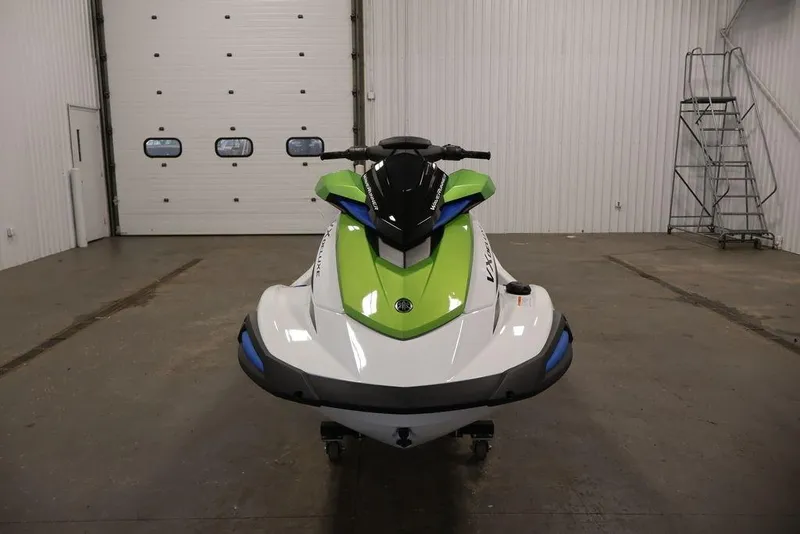 Slide: The Image of 2026 Yamaha WaveRunner VX Deluxe in a garage, featuring a sleek green and white design. - 3