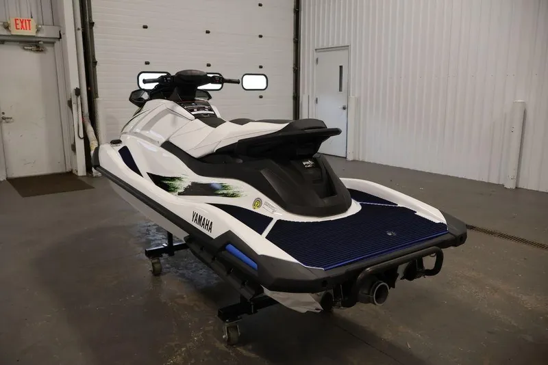 Slide: The Image of 2026 Yamaha WaveRunner VX Deluxe in a garage setting, rear view. - 7