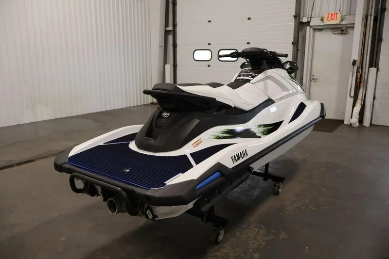 Slide: The Image of 2026 Yamaha WaveRunner VX Deluxe in a garage setting, rear view. - 8