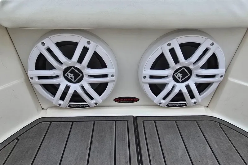 Slide: The Image of 2006 Rinker 246 Captiva Cuddy boat speakers, Rockford Fosgate, on deck. - 16