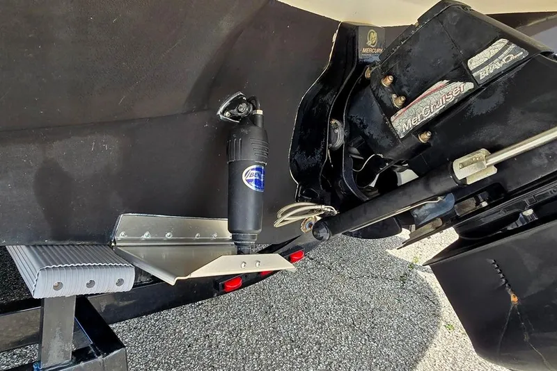 Slide: The Image of 2006 Rinker 246 Captiva Cuddy boat stern with MerCruiser Bravo One outdrive. - 21