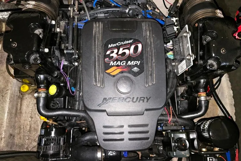 Slide: The Image of MerCruiser 350 MAG MPI engine in 2006 Rinker 246 Captiva Cuddy boat. - 23