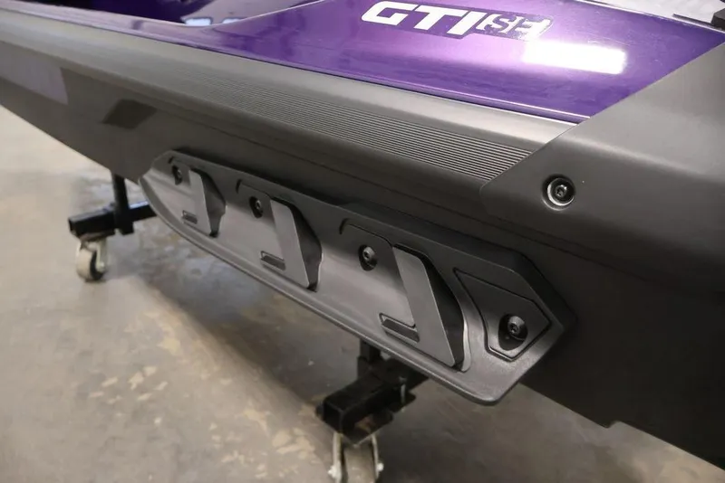 Slide: The Image of 2025 Sea-Doo GTI SE 170, close-up of rear hull design in purple. - 16