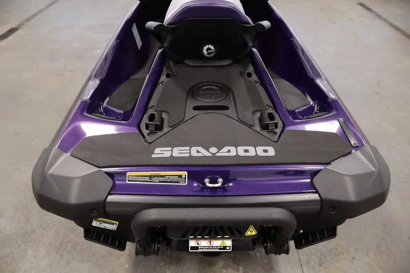 Slide: The Image of 2025 Sea-Doo GTI SE 170 in purple, rear view on a concrete floor. - 20